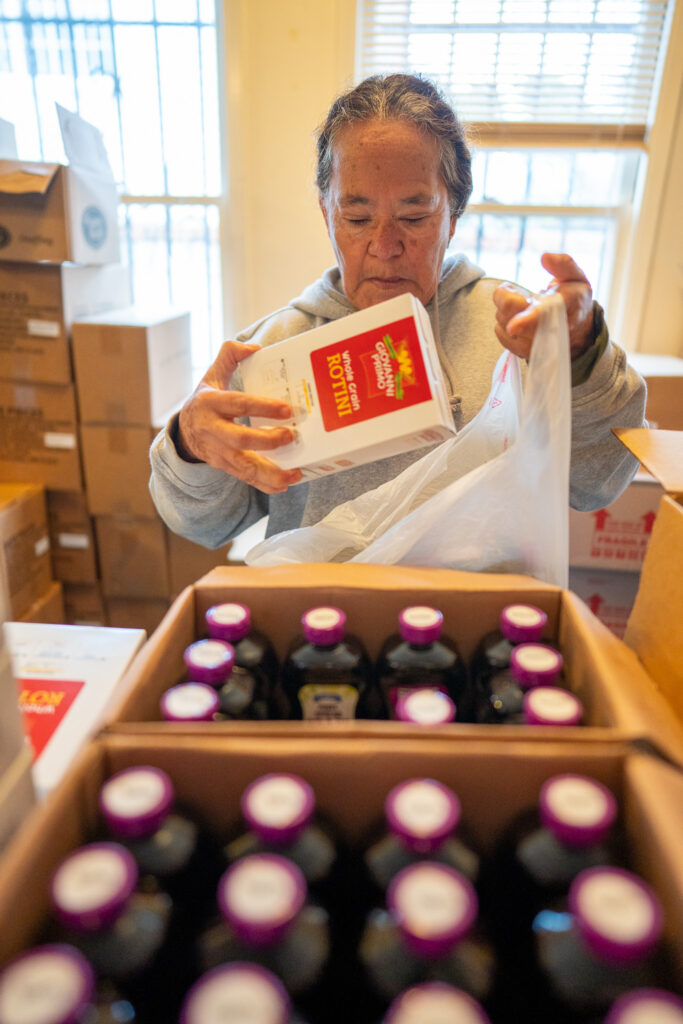 A volunteer at Richmond Emergency Food Pantry.